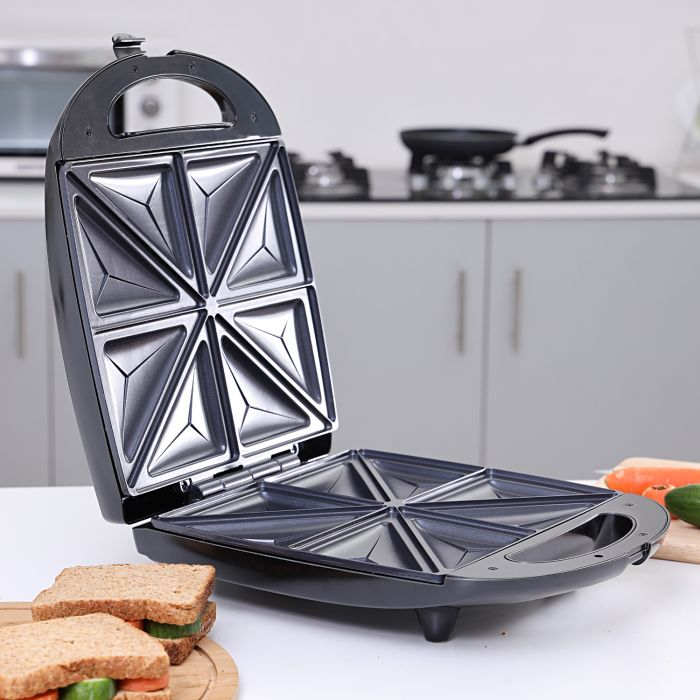 Geepas 1100W 4 Slice Sandwich Maker - Cooks Delicious Crispy Sandwiches - Cool Touch Handle, Automatic Temperature Control And Non-Stick Plate - Breakfast Sandwiches & Cheese Snack - 2 Years Warranty